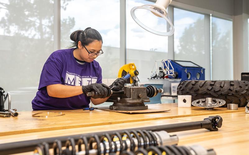 A Mechanical Engineering student works on a project